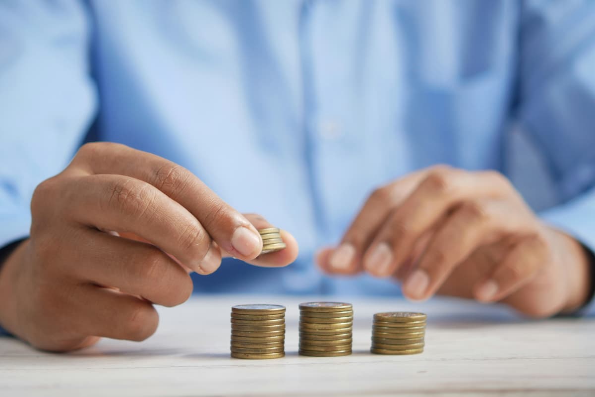 Person calculating salaries with software