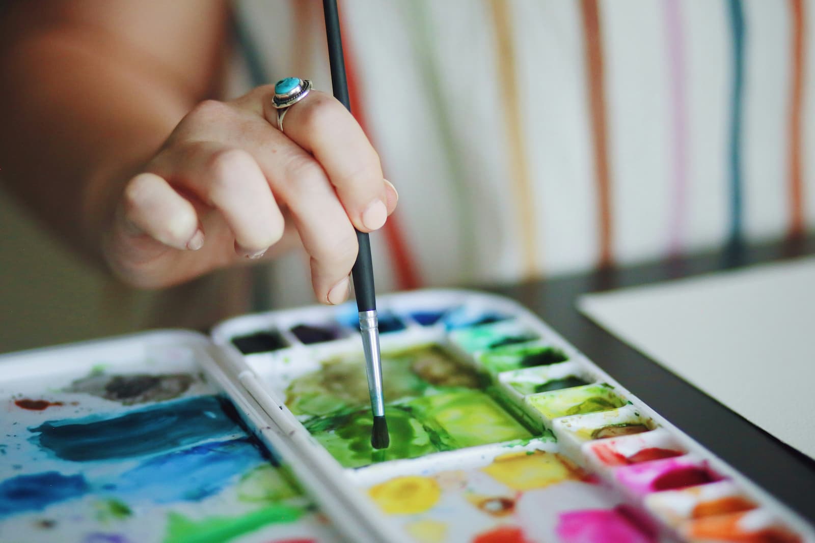 Person making a painting